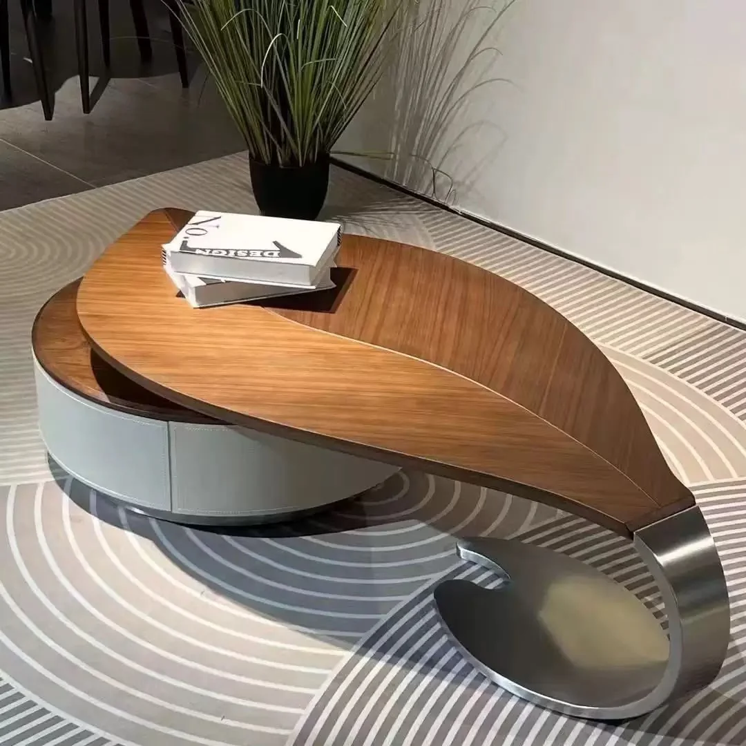 Solid wood coffee table styled with books and a ceramic bowl